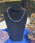 Black lava rock, blue and brown tiers eye necklace